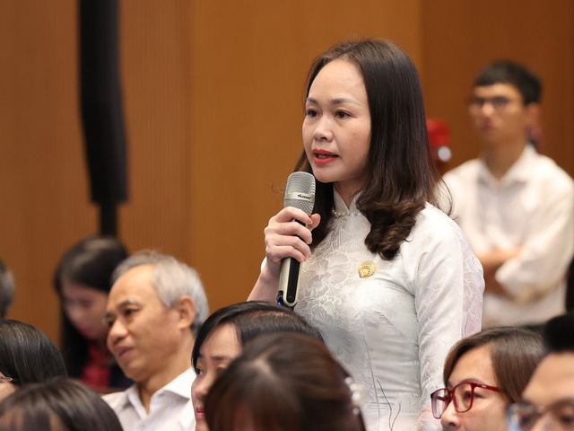 Chị Đỗ Thị Ninh, Tổ chức tài chính vi mô TNHH MTV Tình Thương chi nhánh Nghi Lộc, Nghệ An - Ảnh: Nhật Bắc/VGP