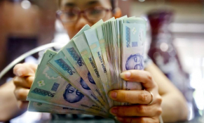 Thu nhập nhân viên ngân hàng tăng giữa làn sóng cắt giảm lao động